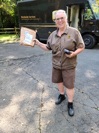 Nora from UPS Delivers the Package